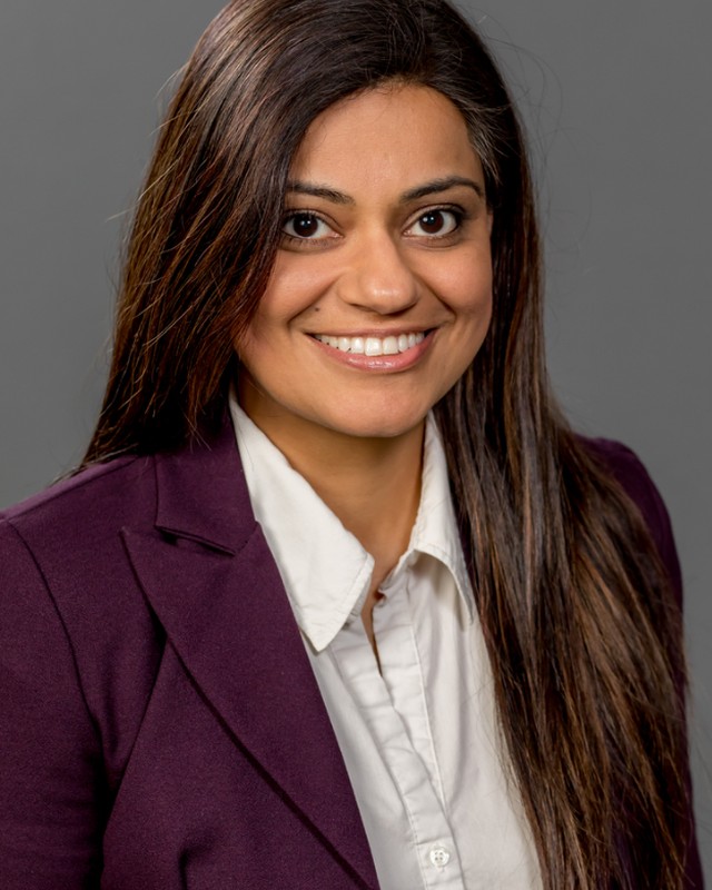 Female clinician portrait representing clinical leadership